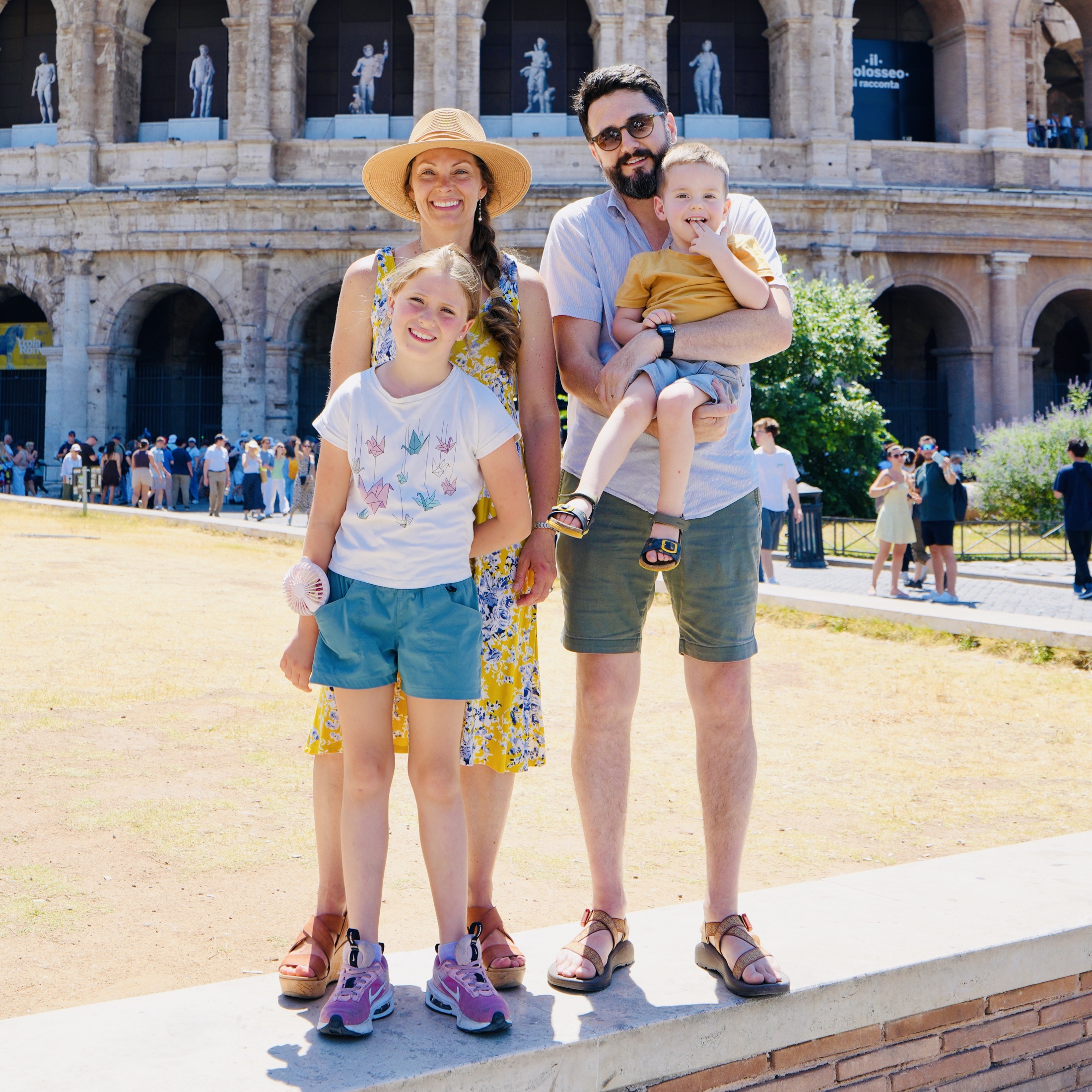 Justin and Rebekah Wright with MaryEllen and Franklin in front of the Colosseum in Rome